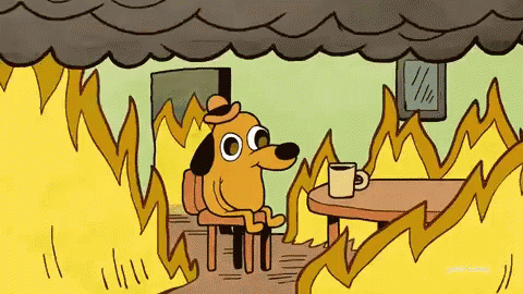GIF of a cartoon dog sitting at a table in the middle of a fire saying "this is fine" for Jackson Properties blog.